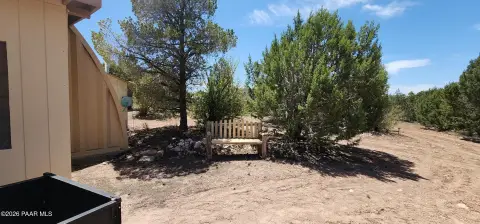 Fenced Ranch Land with Quonset Hut