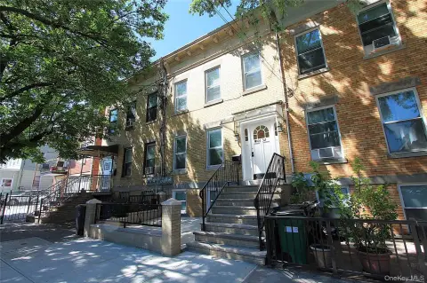 Two-Family Brick Home with Yard