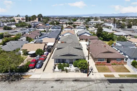 Triplex With Detached Garages