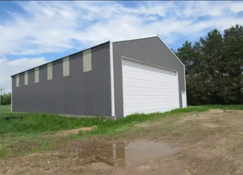 Farmland with Airplane Hangar