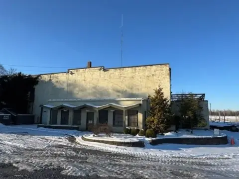 60 Acres with Multiple Buildings