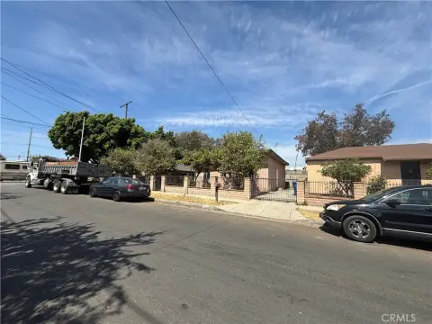 Mixed-Use Triplex with Gated Parking
