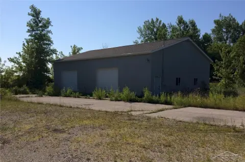 Vacant Warehouse Site with Barn