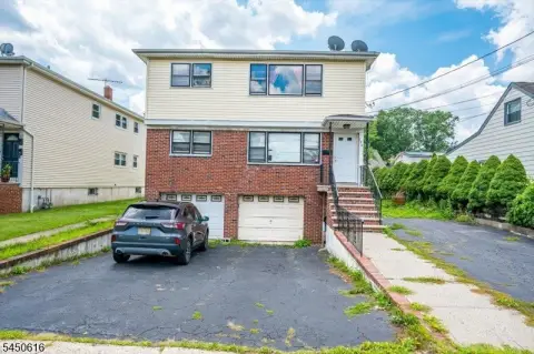 Duplex with Built-In Garage