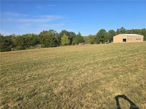 Multi-Tract Land with Metal Shop