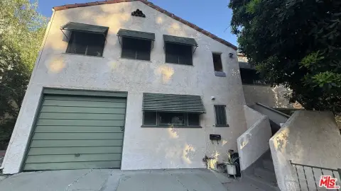 Spanish-Style Duplex with Garden