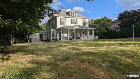 Four-Unit Property with Carriage House
