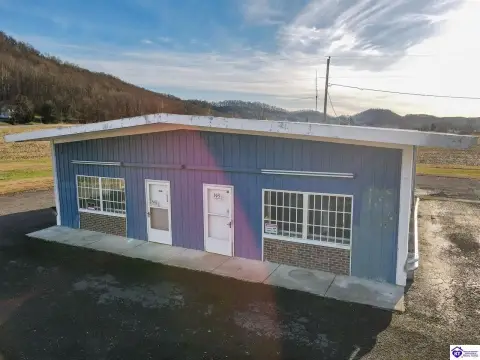 Versatile Commercial Property on Full Acre