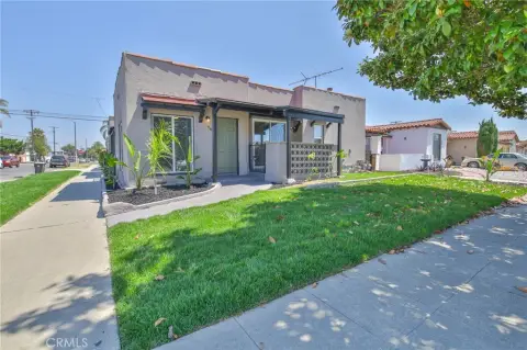 Corner-Lot Duplex With Detached Garage