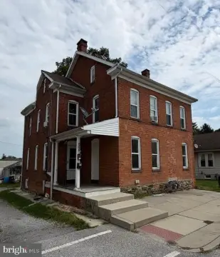 Brick Duplex with Rental Income