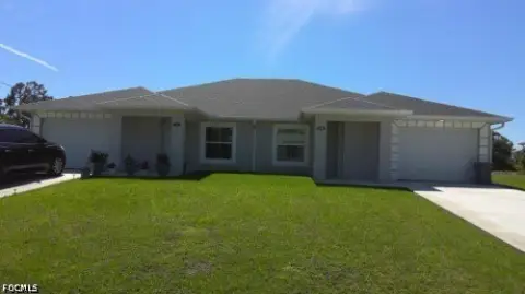 Duplex with Private Garages