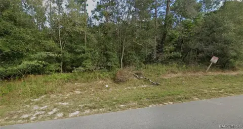 Paved-Road Vacant Lot