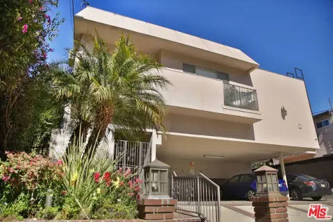 Four-Unit Multifamily with Townhouse-Style Residence