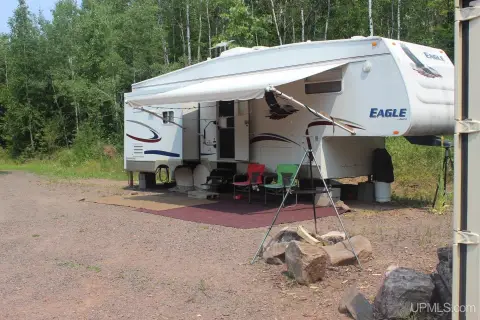 Wooded Recreation Land with Camp