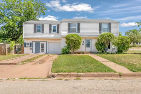 Duplex with Private Yards and Shop