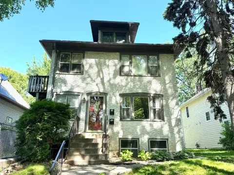 Two-Unit Duplex With Sun Rooms