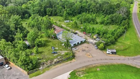 Commercial Land with Automotive Building