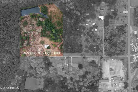 Cleared Land with Pond