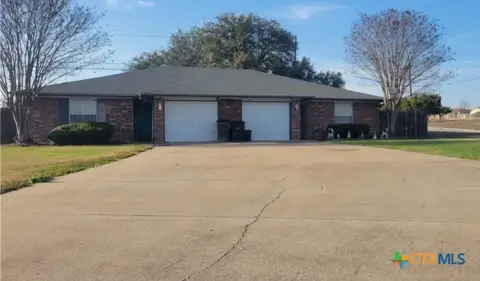 Corner Lot Duplex With Private Yards