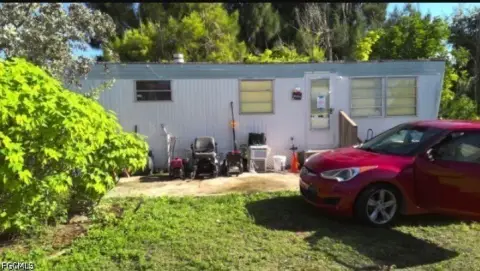 Business-Zoned Land with Mobile Home