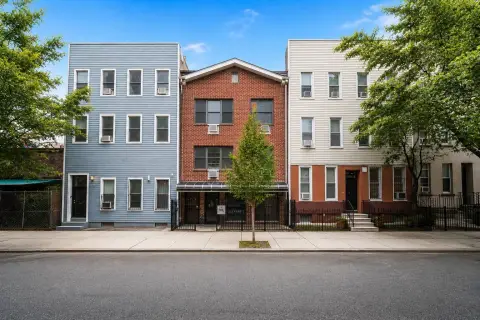 Brick Triplex with Private Backyard
