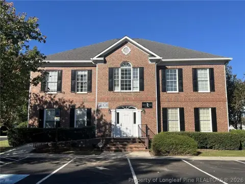 Brick Office Building with Ground-Floor Suite