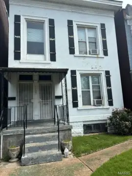 Duplex with Porches and Gated Entry