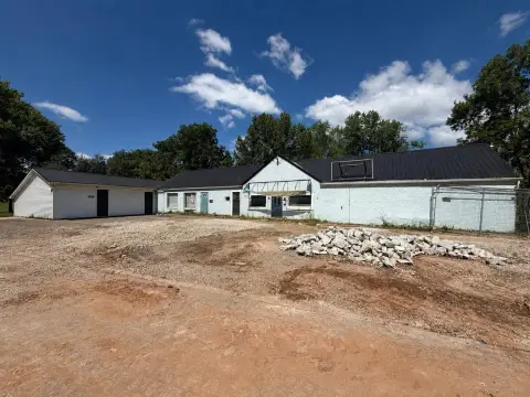 Duplex Building with Apartments and Commercial Space
