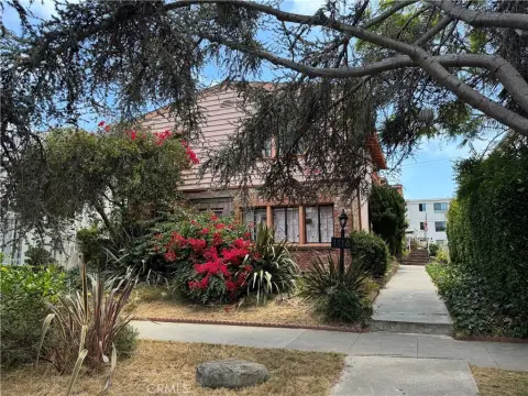 1937 Spanish-Style Apartment Building with Carports