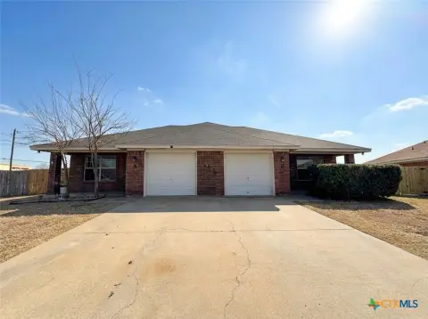 Well-Maintained Duplex with Fenced Yards