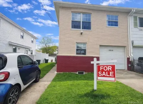 Cozy Jamaica Two-Family House