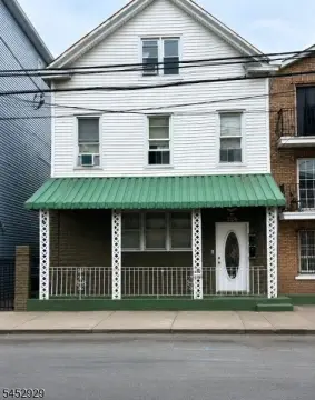Three-Unit Triplex with Backyard