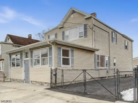 Seven-Bedroom Duplex with Garage