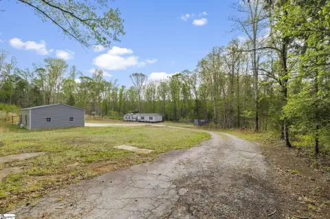 Unrestricted Land with Four-Bay Shop