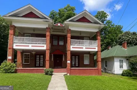 Brick Quadplex with Updated Units
