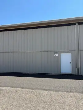 Airport Hangar with Aircraft Equipment