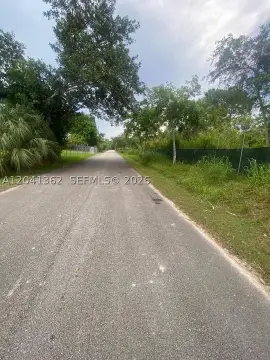 Fenced Canal-Front Land Opportunity
