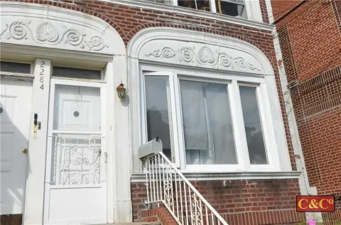 Brick Triplex with Detached Garage