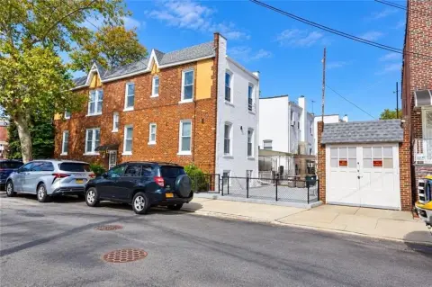 Brick Duplex with Detached Garage