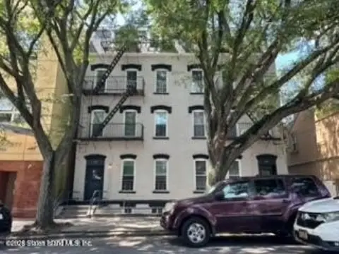 Two Attached Four-Family Buildings