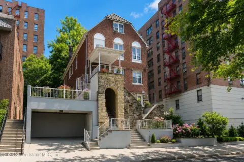 Triplex with Brick and Stone Exterior