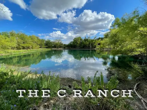 Fenced Ranch Acreage with Pond