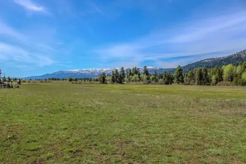 Land with Mountain and Lake Views