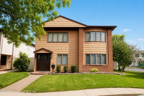 Colonial Duplex with Detached Garage