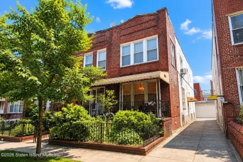 Brick Duplex With Garage