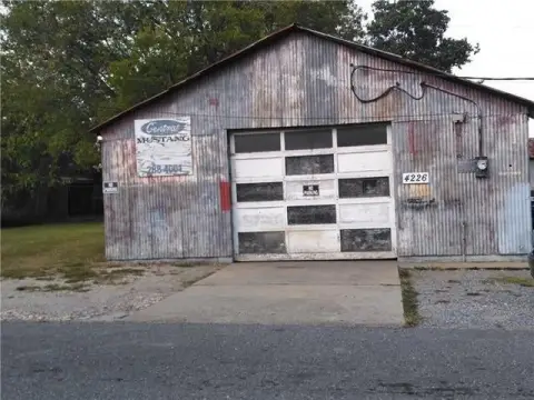 Two Auto Shops with Vacant Lots
