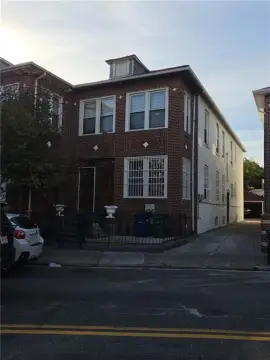 Brick Duplex with Detached Garage