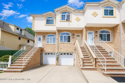 Brick Duplex with Built-In Garage