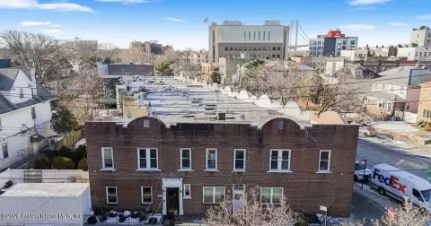 Renovated Brick Triplex