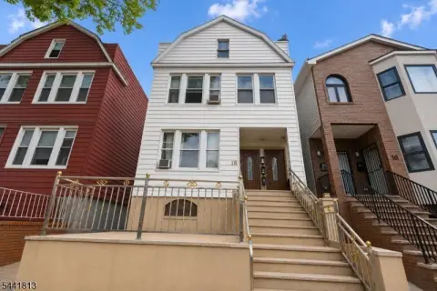 Two-Family Home with Private Deck